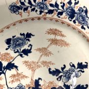 Japan, Imari porcelain plate with bamboo and peonies, 19th century.