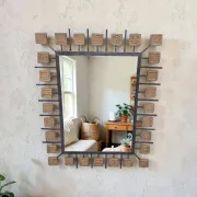 Rectangular brutalist mirror in wrought iron and terracotta tiles.