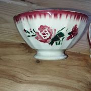 Bowls Faïencerie de Sarreguemines with rose decoration (the two red ones)