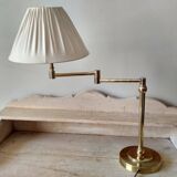 Large golden brass lamp with a movable arm - adjustable desk lamp