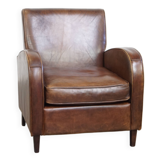 A stately, well-preserved, and comfortable sheepskin armchair