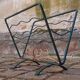Wrought iron magazine rack from the 1950s