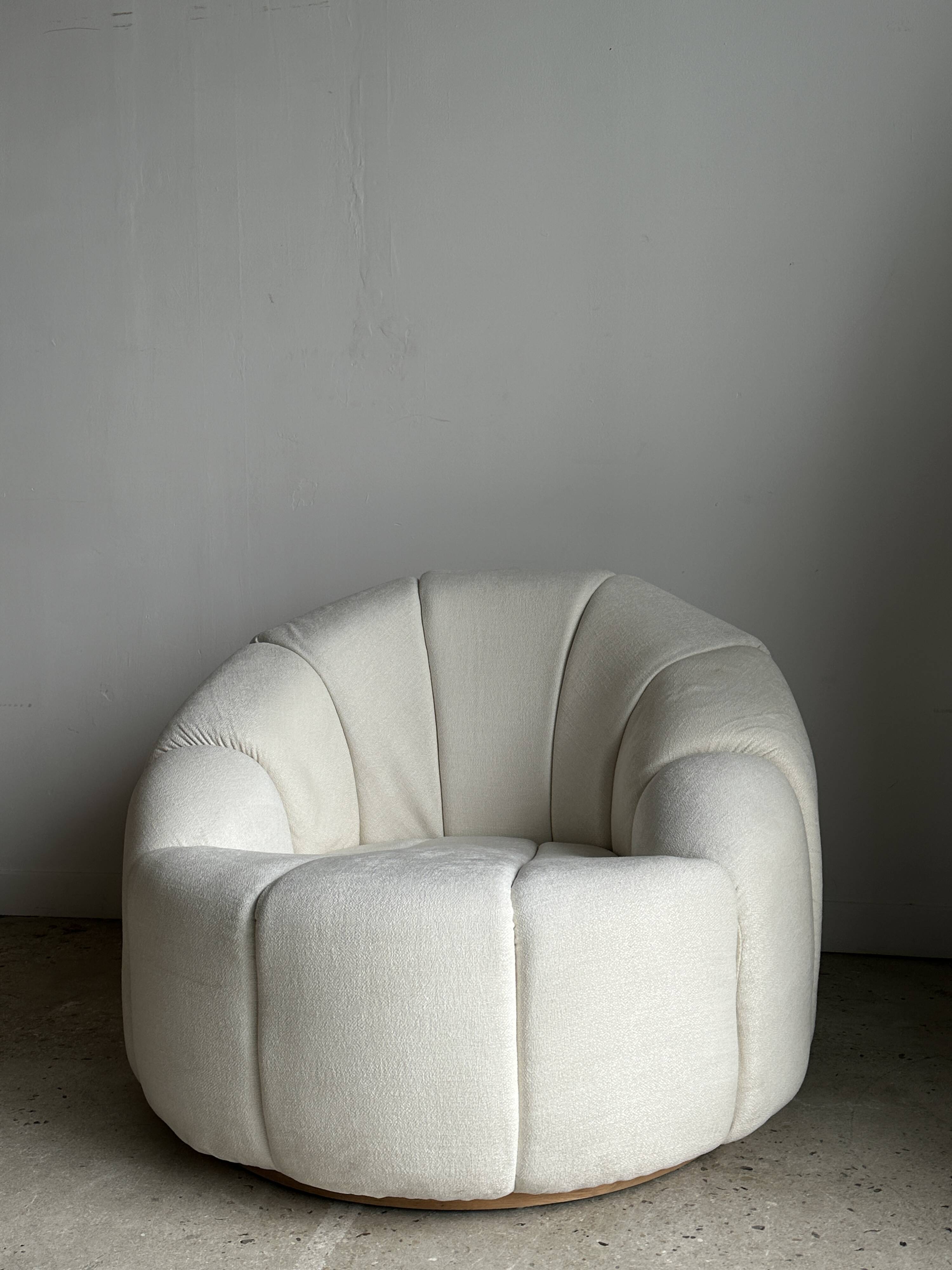 Large white circular armchair, white fabric upholstery