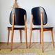 Paire de chaises vintage 1960 – Pieds compas & Simili-cuir noir