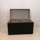 Large travel trunk in blackened wood