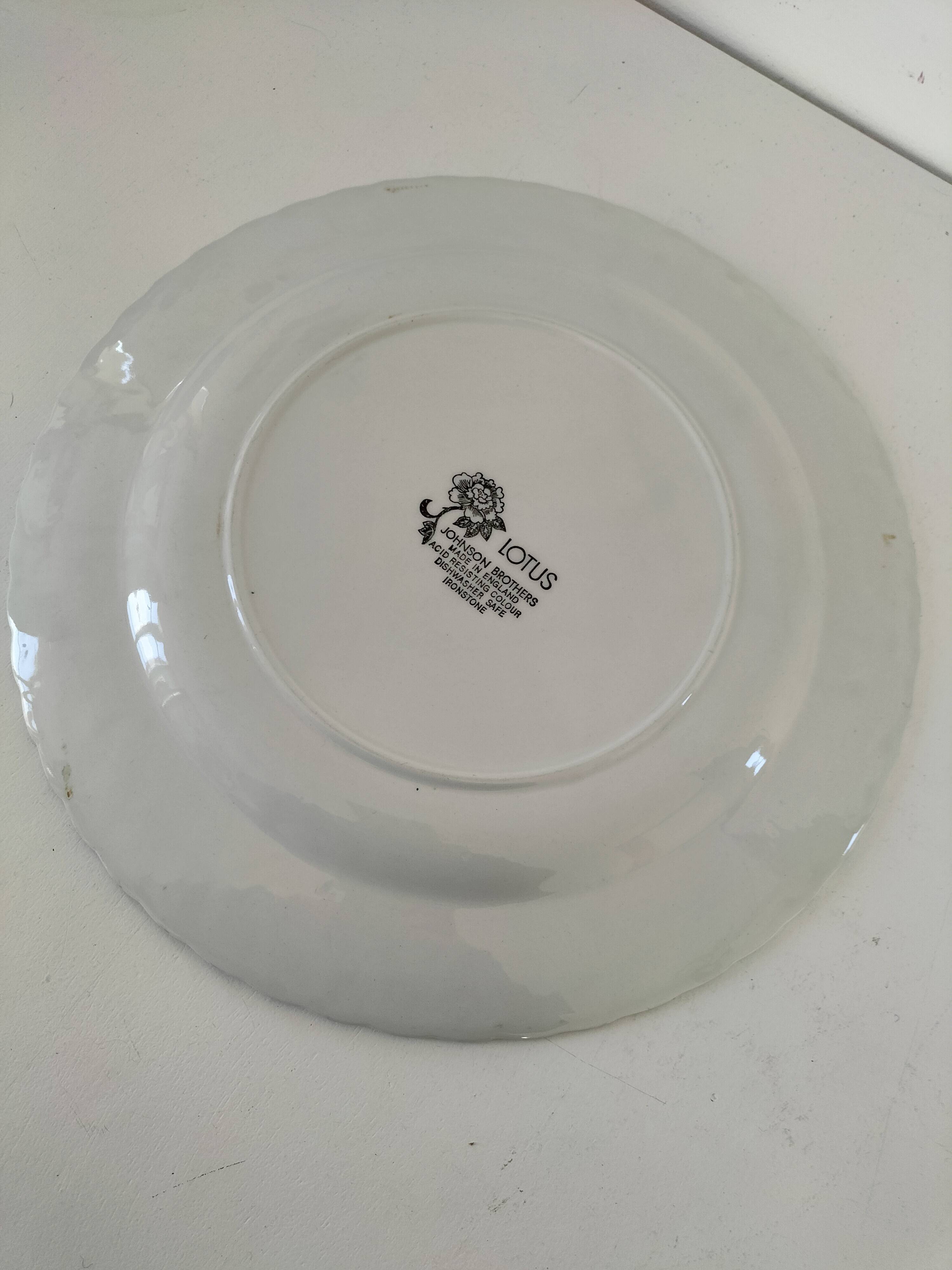 Round antique plate by Johnson Brothers in the Blue Lotus pattern.