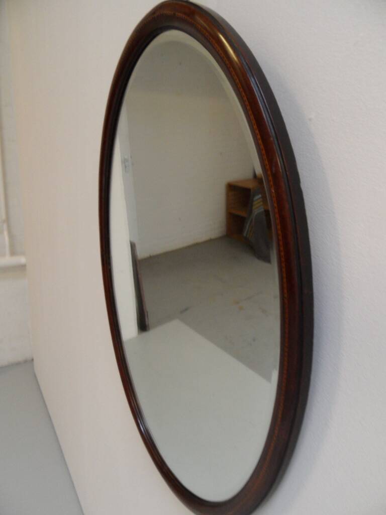 Antique mahogany oval mirror
