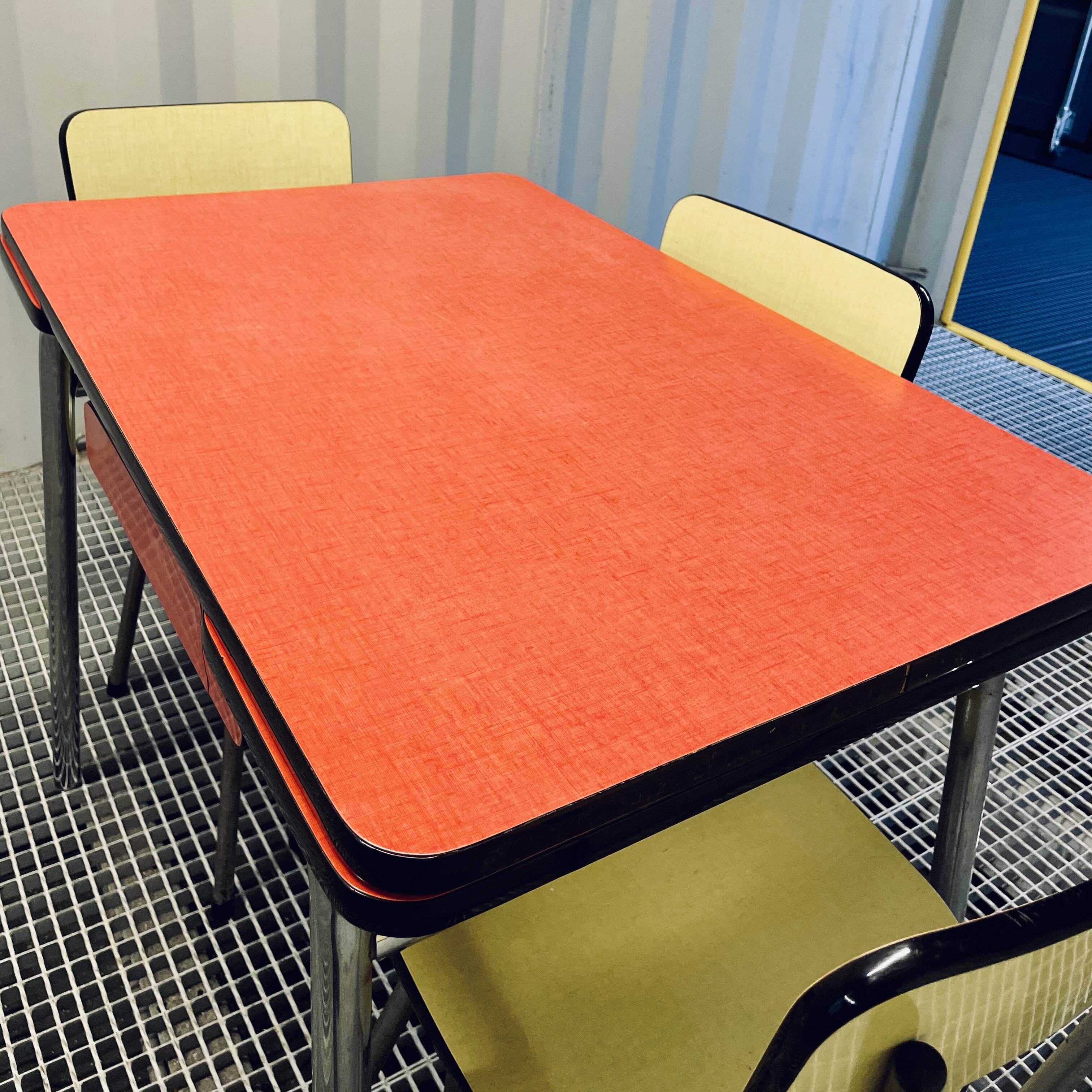 Red Formica table and vintage yellow chairs