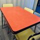 Red Formica table and vintage yellow chairs