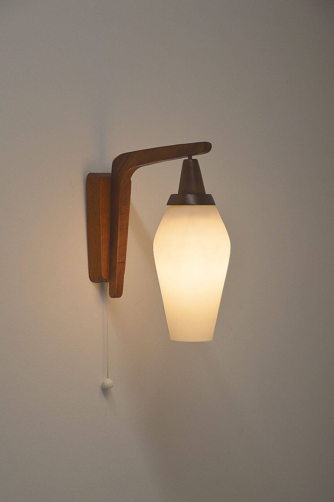 Danish wall lamp in teak with milk glass, 1960s