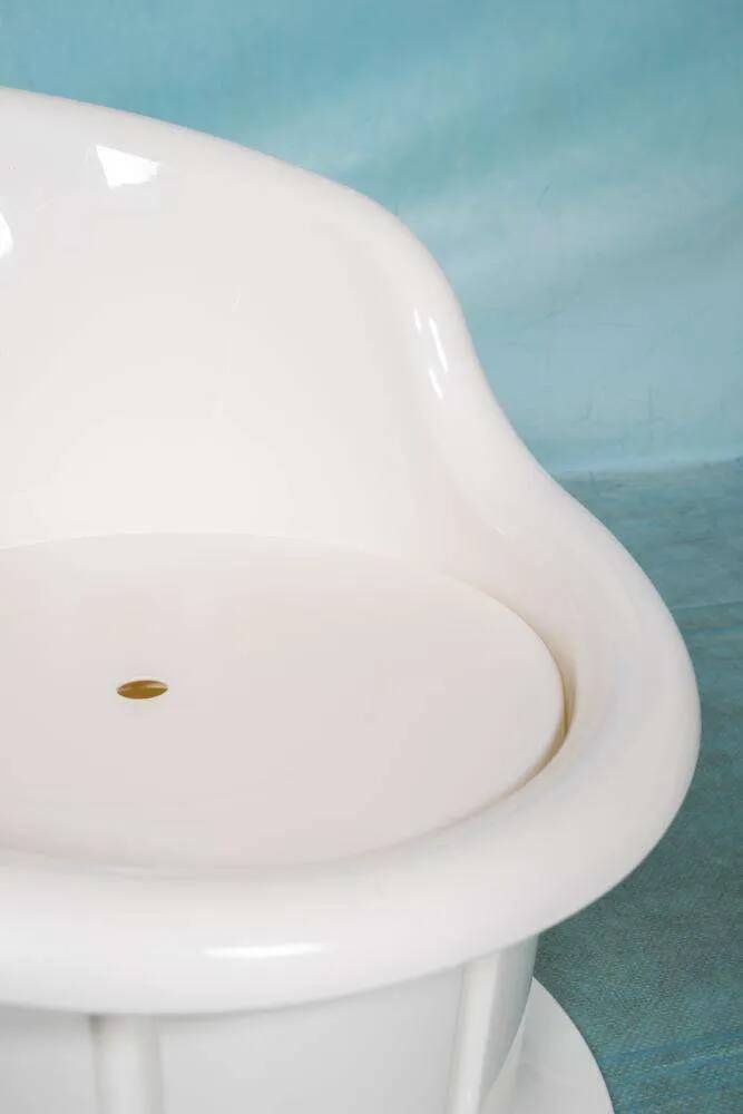 Space-age shell chair with storage, Ikea Popptorp chair.