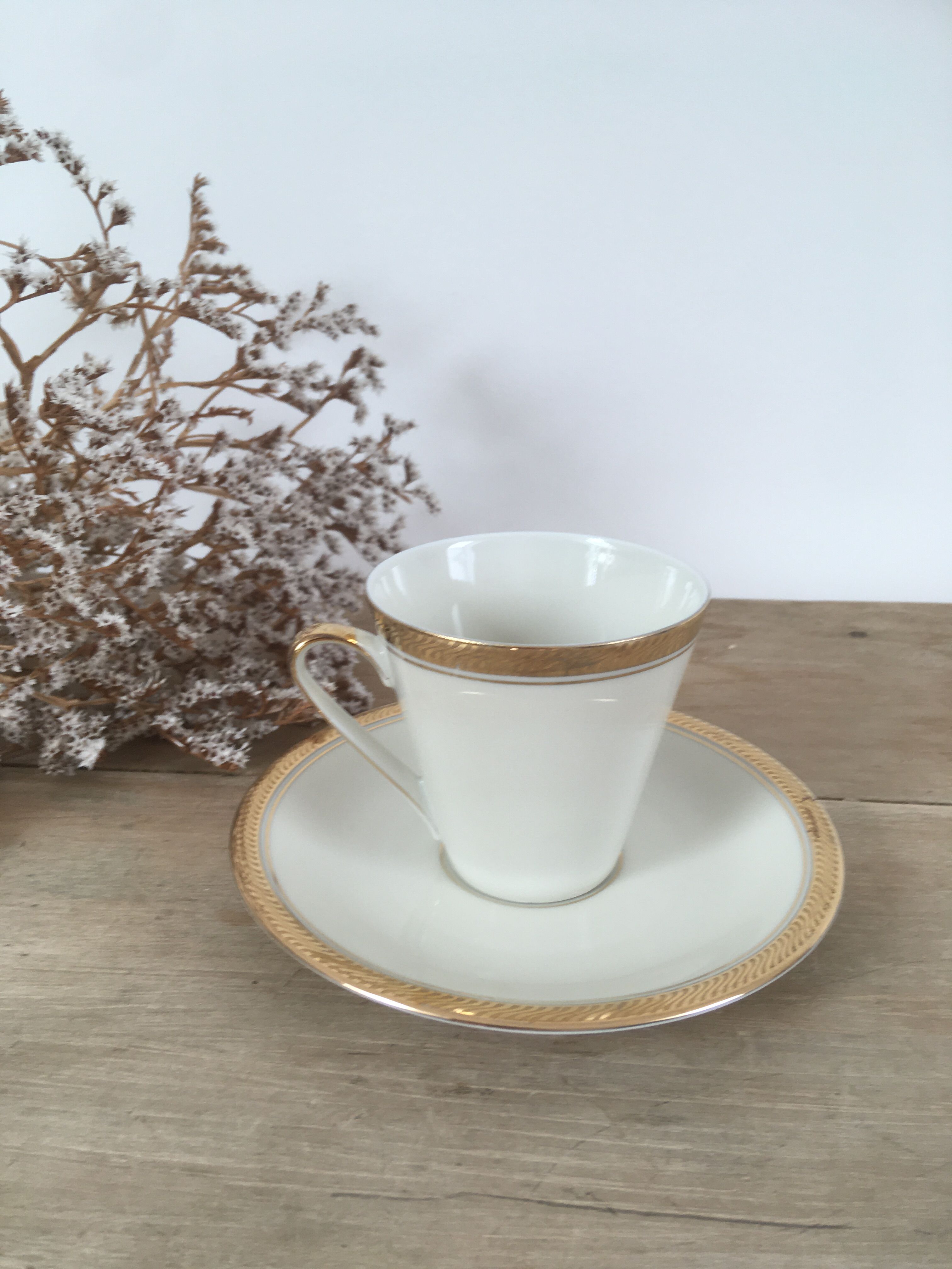 White & gold porcelain coffee cups