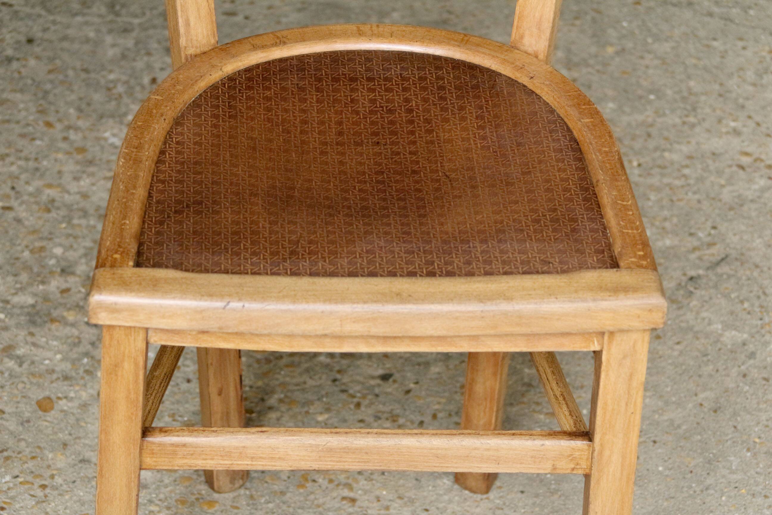 Early 20th century wooden bistro chair.