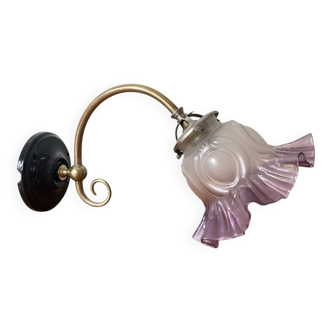 Swan neck wall light in brass with glass tulip.