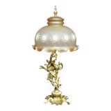Table lamp with a tall base.
