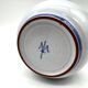 Blue glazed earthenware vase – stylized floral decoration – signed on the base
