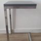 Contemporary C design side table — Heavy chrome steel and top