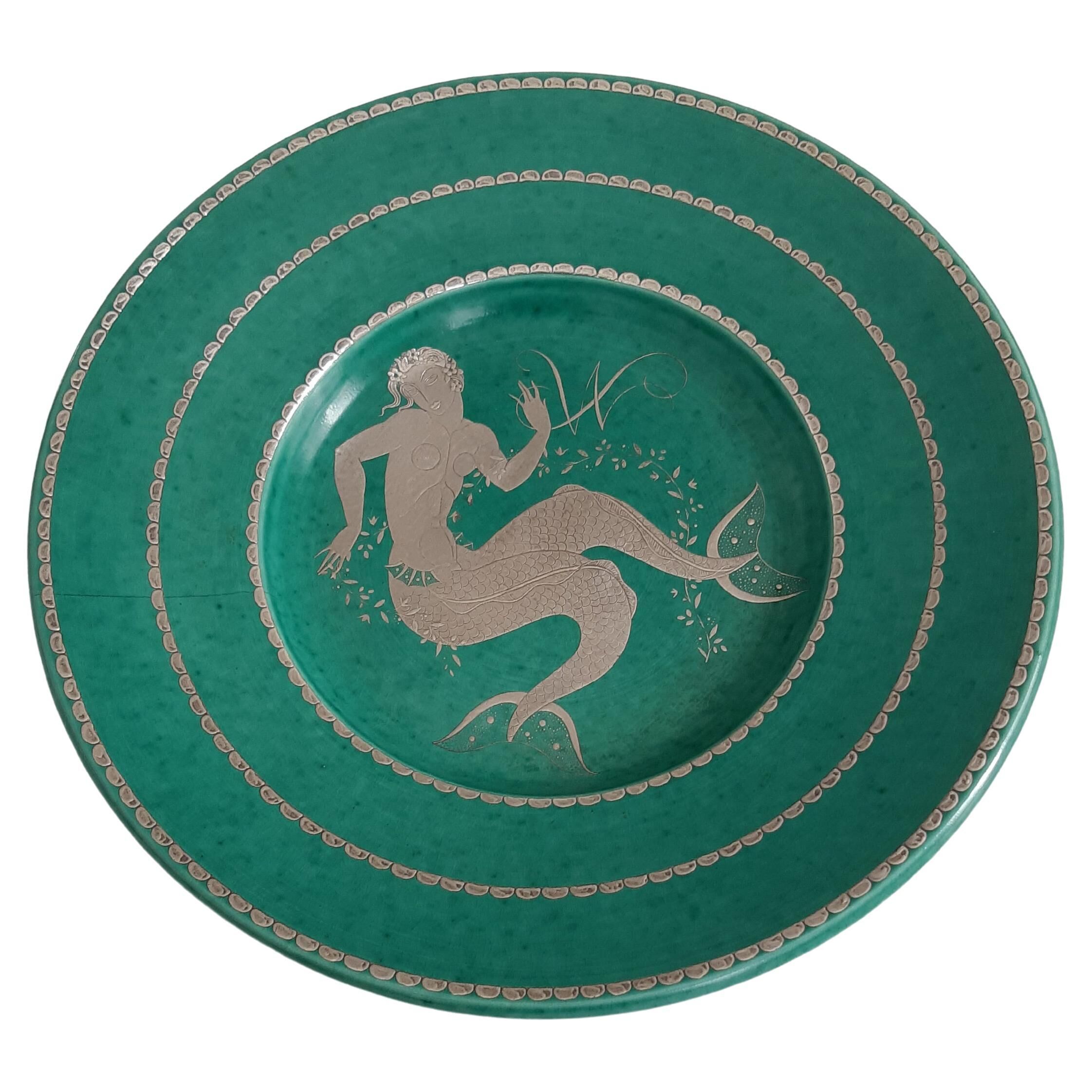 Plate by wilhelm kage "argenta" gustavsberg sweden 1944. signed and dated.