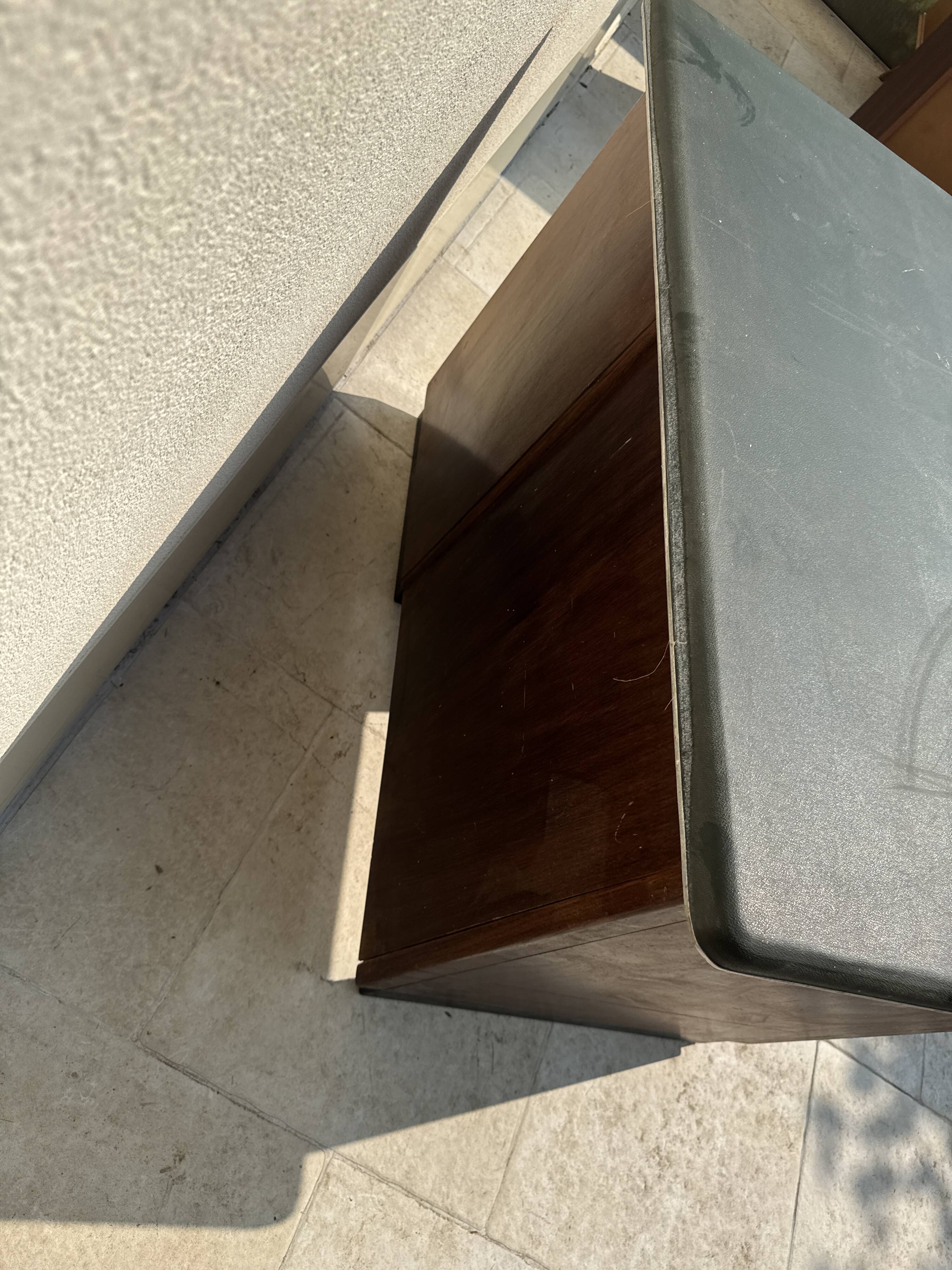Modernist desk in wood and green moleskin upholstery