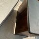 Modernist desk in wood and green moleskin upholstery
