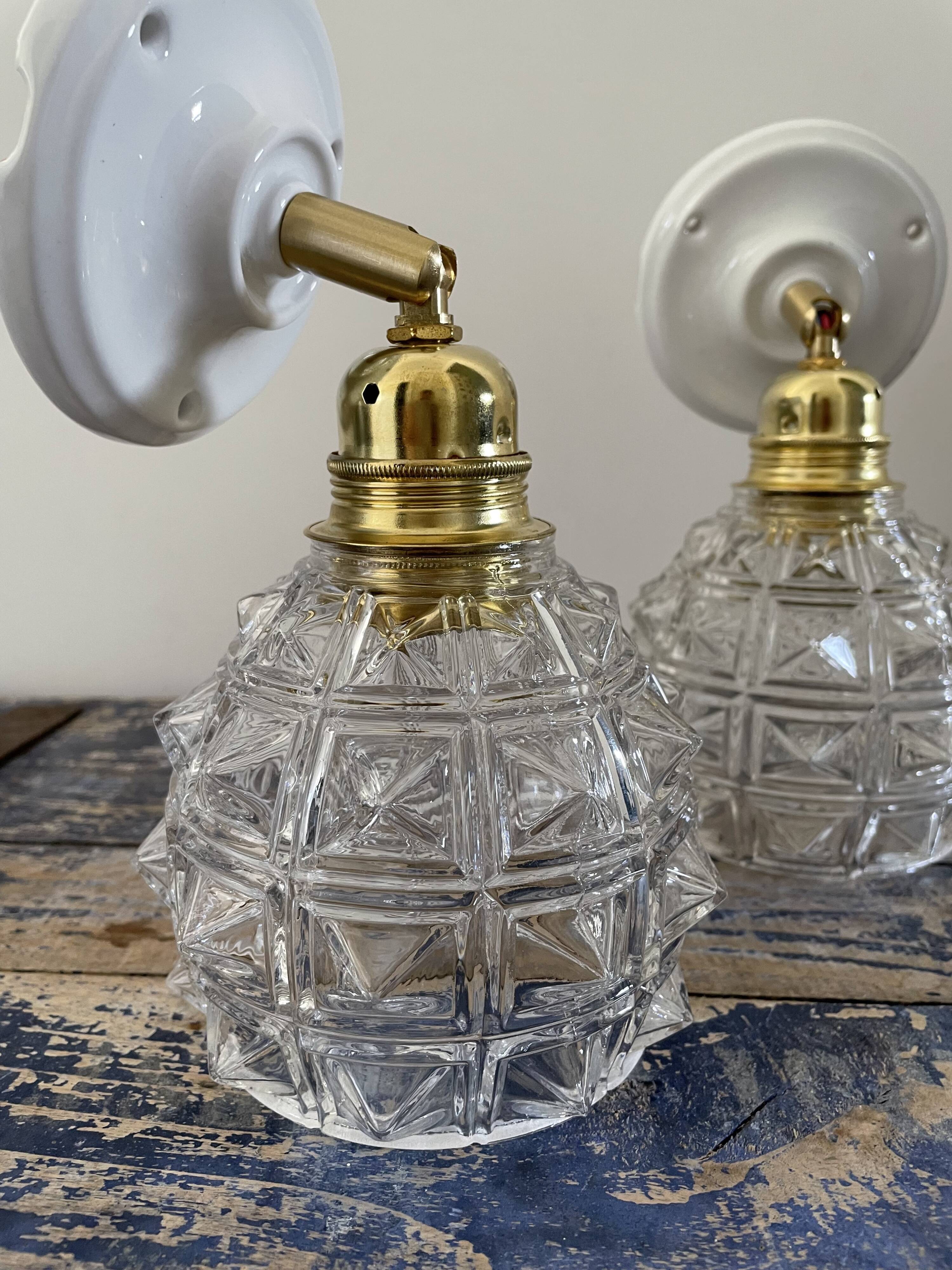 Pair of new electrified chiseled glass sconces