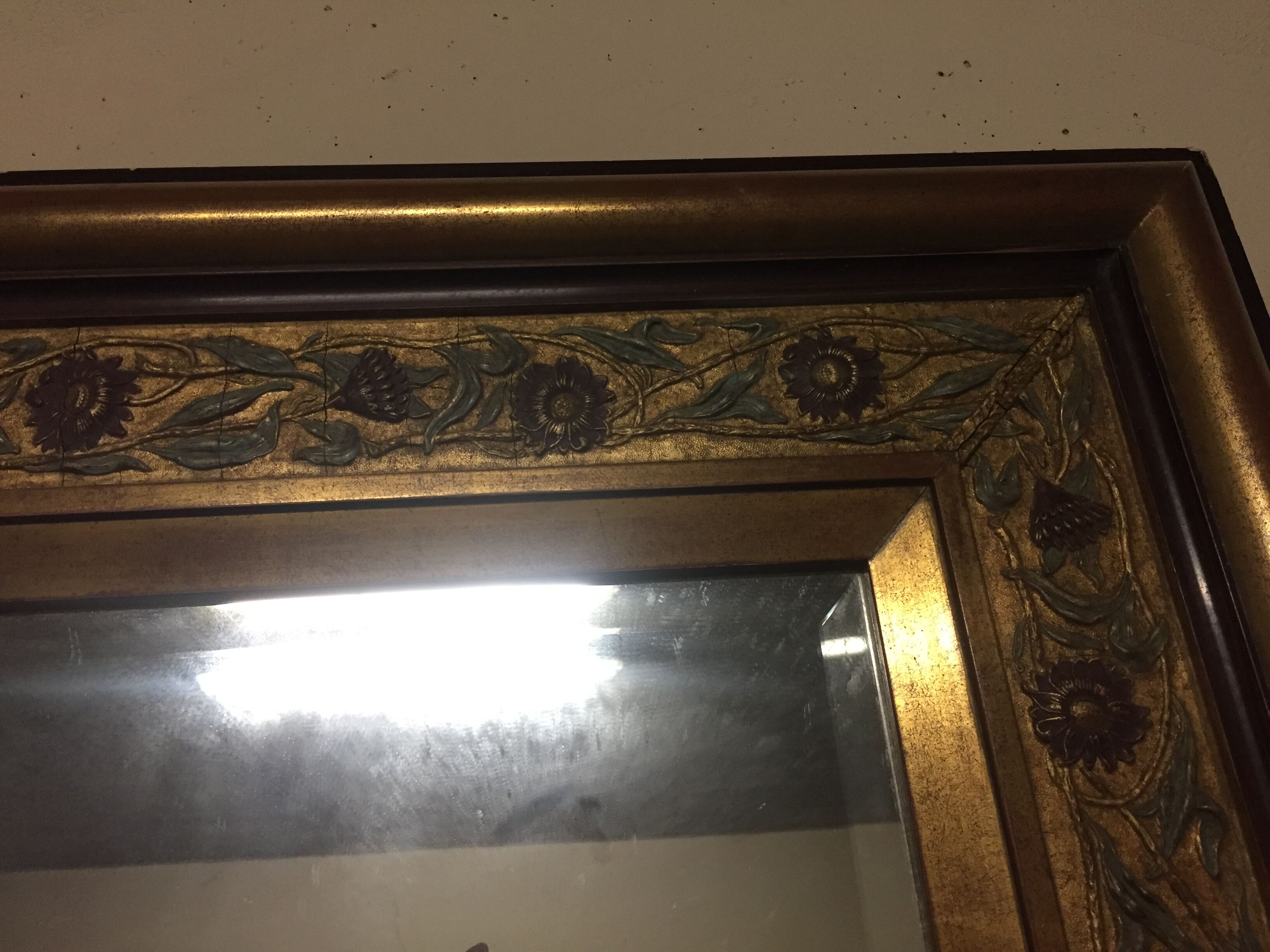 Golden polychrome mirror