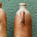 Set of two German stoneware bottles Herzoghthum Nassau Selters.
