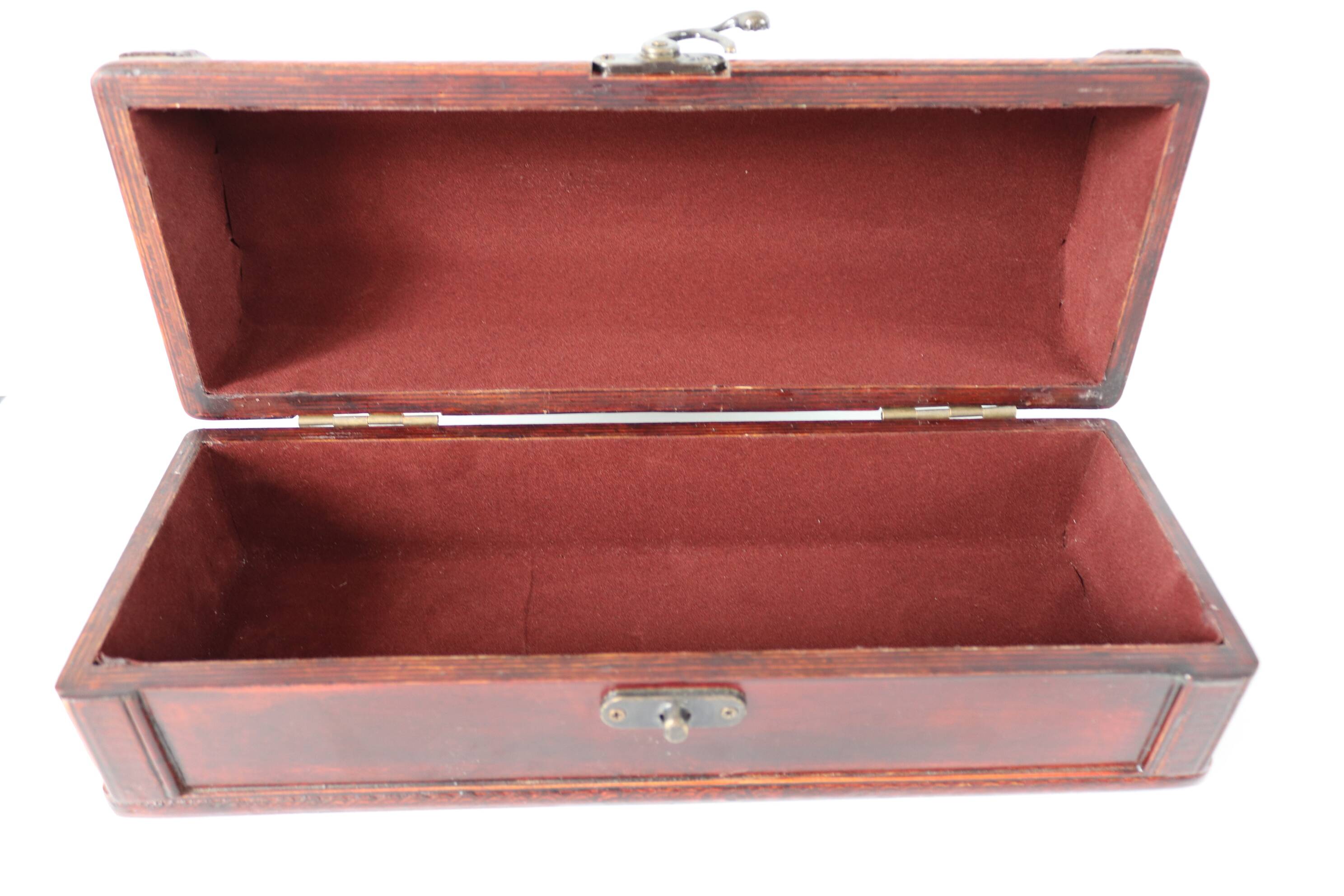 small wooden and brass trunk