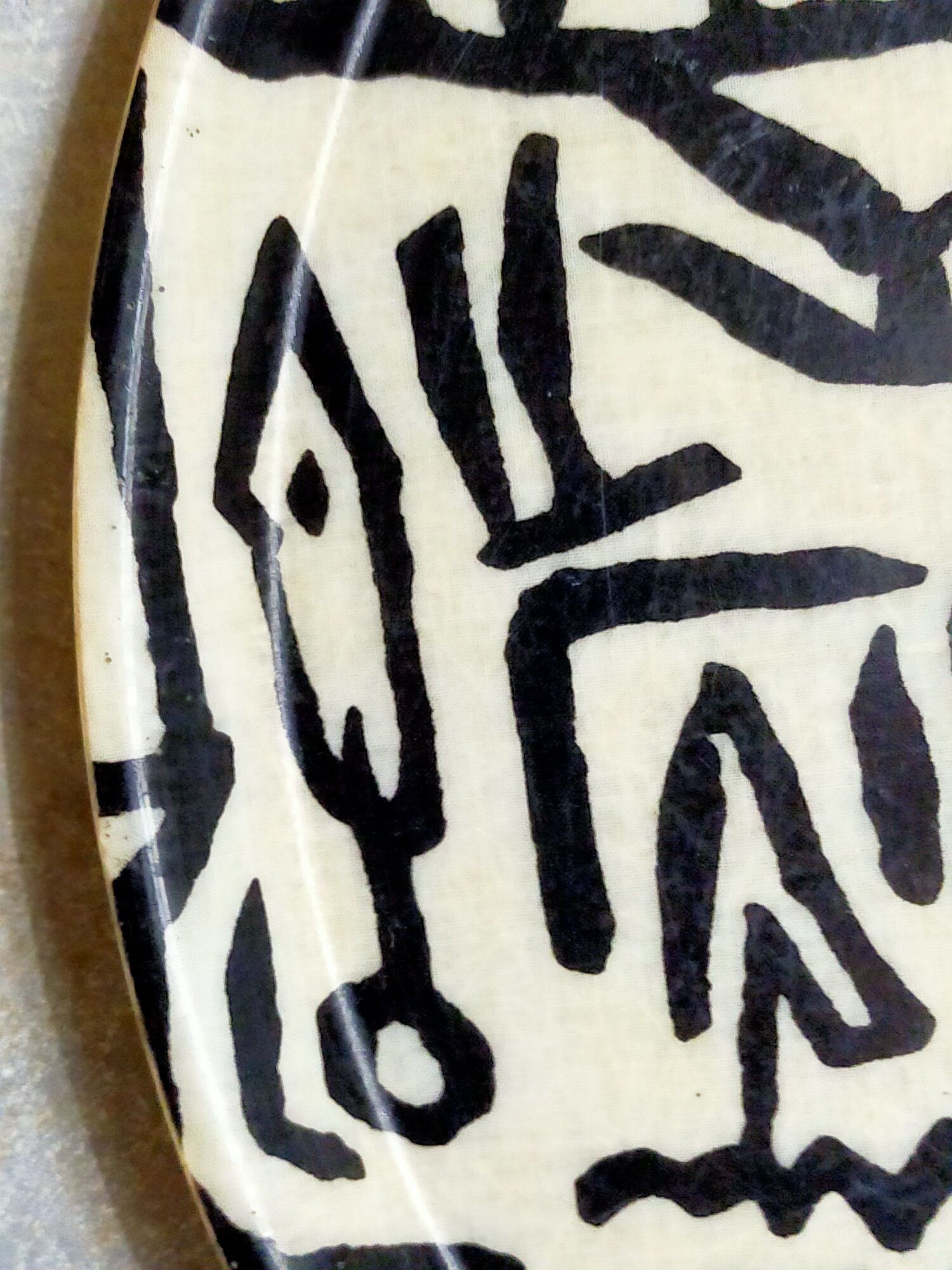 Vintage fiberglass tray with graphic patterns