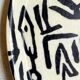 Vintage fiberglass tray with graphic patterns