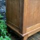 Solid oak compass foot cabinet René Gabriel 1945