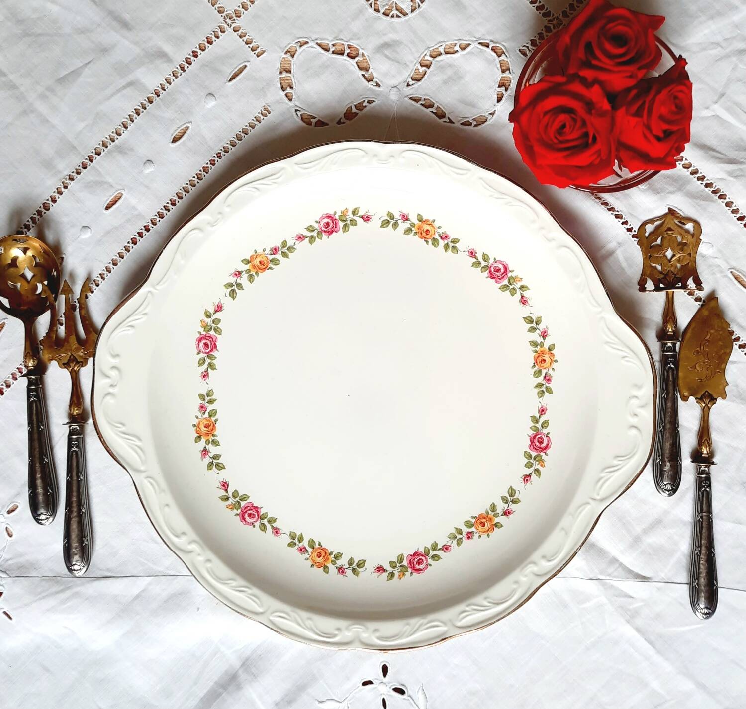 Old mismatched earthenware dessert plates with gold accompanied by a dish