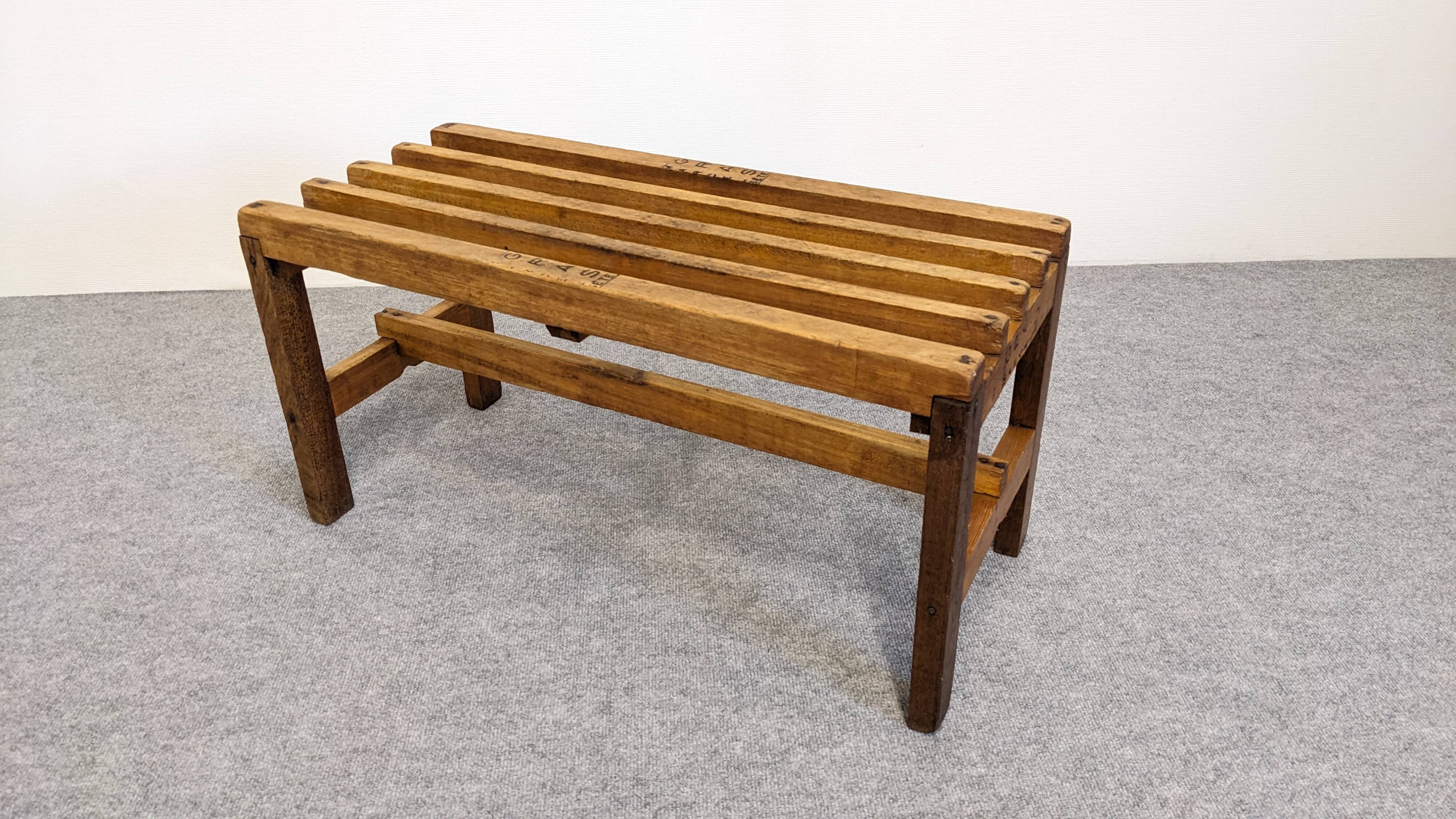 Wooden slatted display bench or support, France circa 1960.