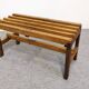 Wooden slatted display bench or support, France circa 1960.