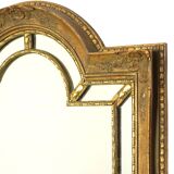 Magnifique miroir milieu du siècle de style Louis XVI rococo, miroir bombé en bois recouvert d'or