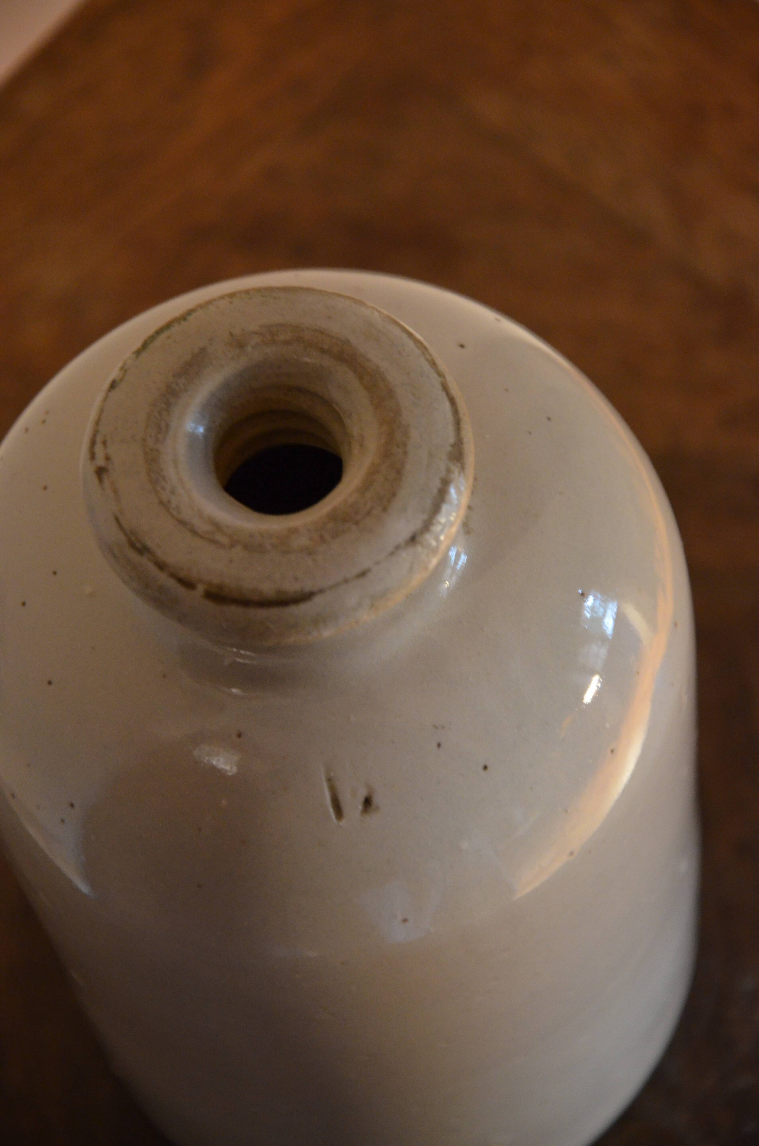 Off-white ceramic soliflore bottle