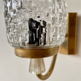 Gold metal and chiseled glass wall sconce