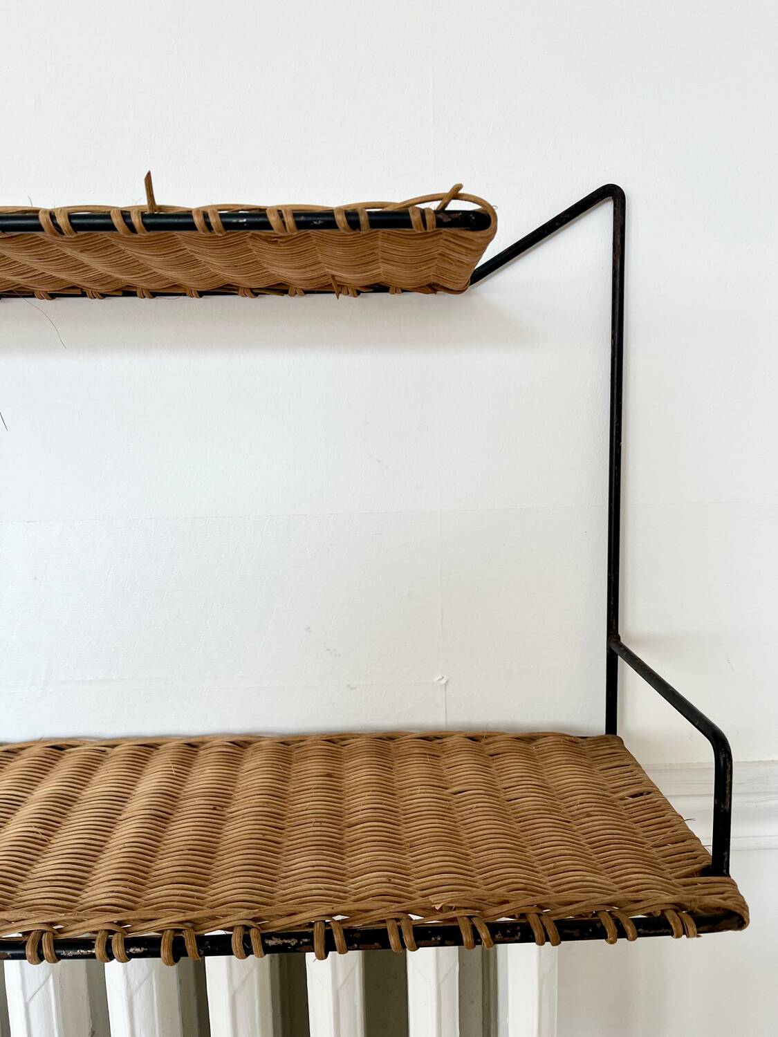 Raoul Guys rattan wall shelf 1950