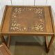 Set of 3 nesting tables in teak with tiled tops.