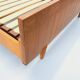 Double bed vintage Scandinavian in teak from the 1960s with integrated bedside tables.