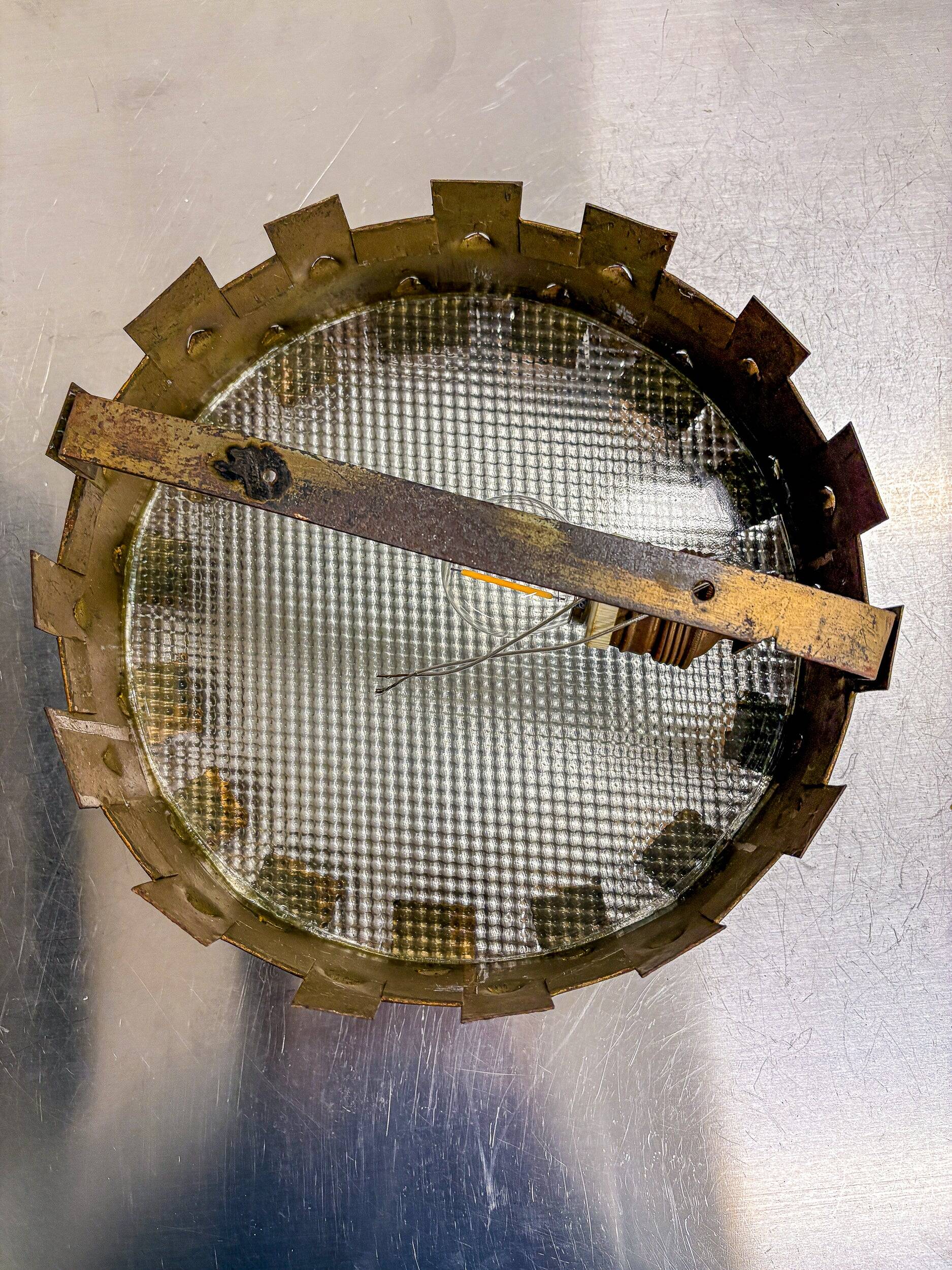 Brutalist crown sunburst fixture in gilt metal and frosted glass, France, 1960s
