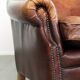 Comfortable cowhide wingback armchair in English style