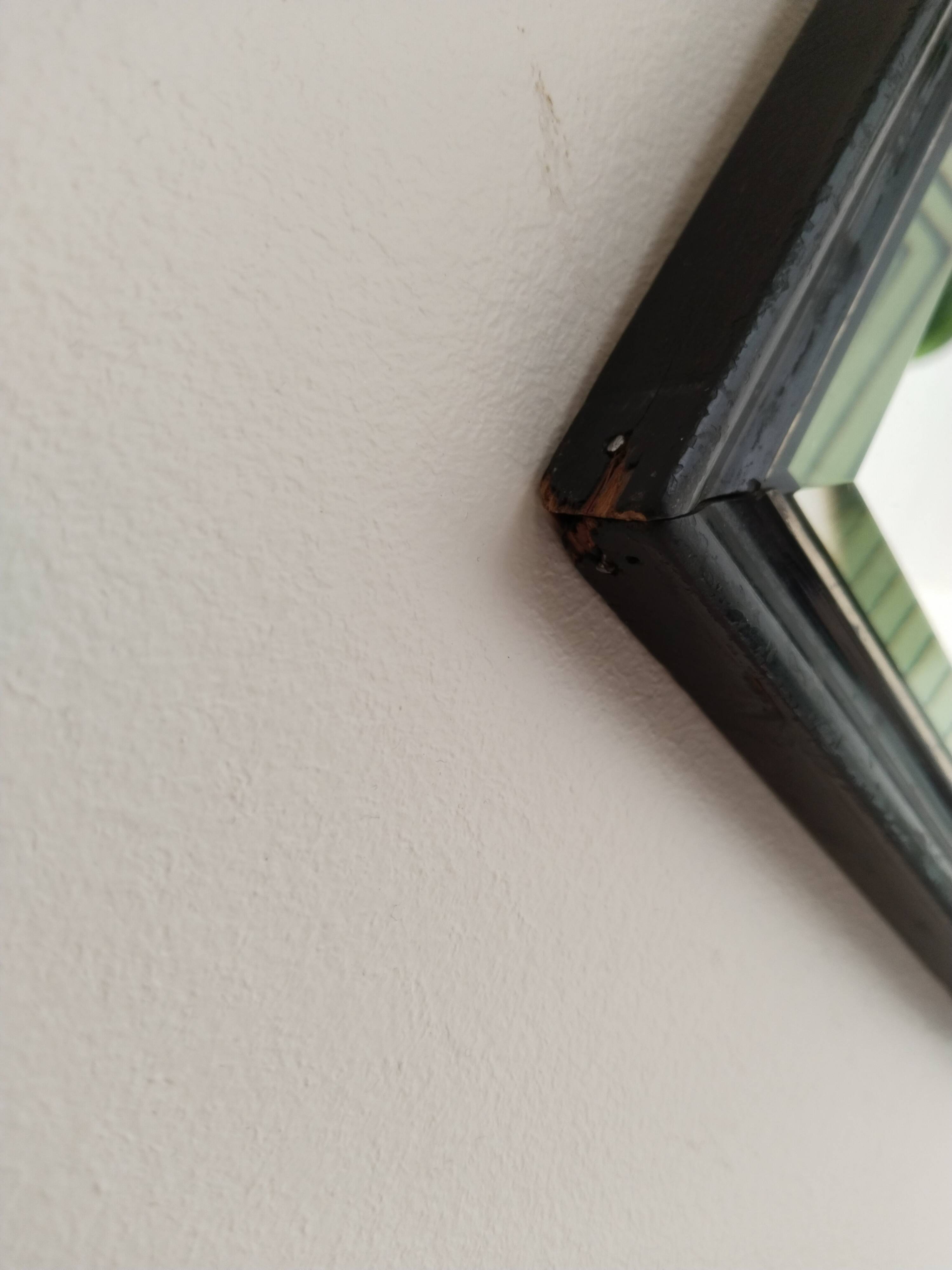 Antique Napoleon III beveled mirror, black and gold