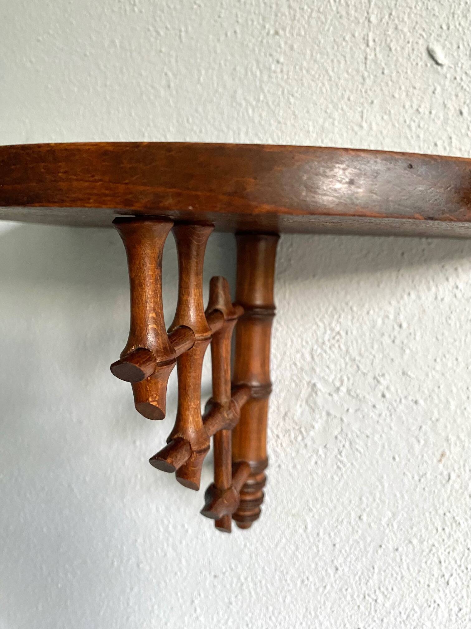 Wooden wall shelf, bamboo sculpture