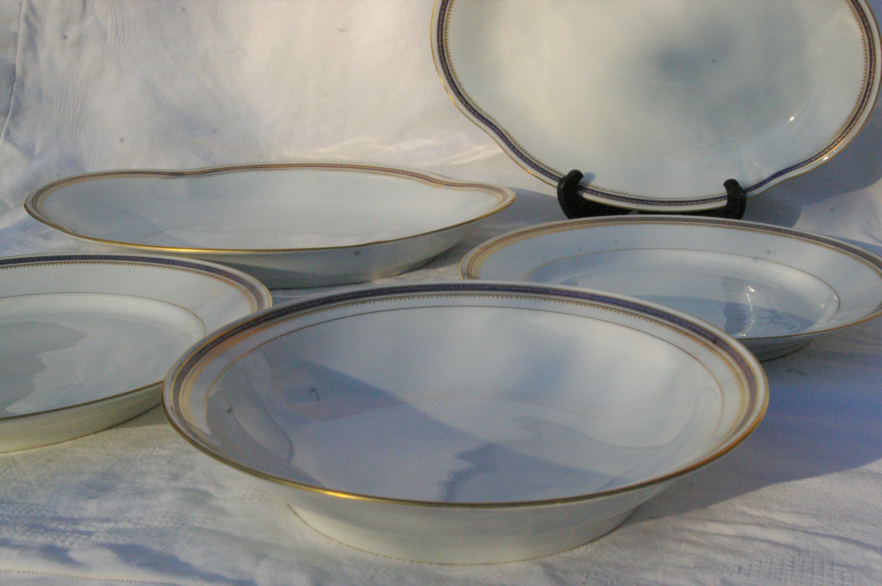 Table service 58 pieces in limoges porcelain uc - blue and gold border