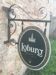 Double-sided "Loburg Beer" metal sign on wrought iron bracket