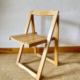 Folding chairs designed by Aldo Jacober in solid beech wood.