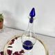 Art Deco glass carafe with glass stopper and blue base 0.7 l