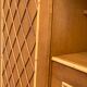 Rattan wardrobe with tapered legs from the 1960s.