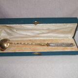 Laouche has creme sleeve silver